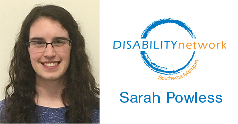 Sarah is a young woman with long dark hair, light skin, and wears glasses. 