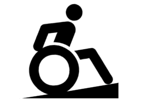 Icon of person using a wheelchair going up a ramp.