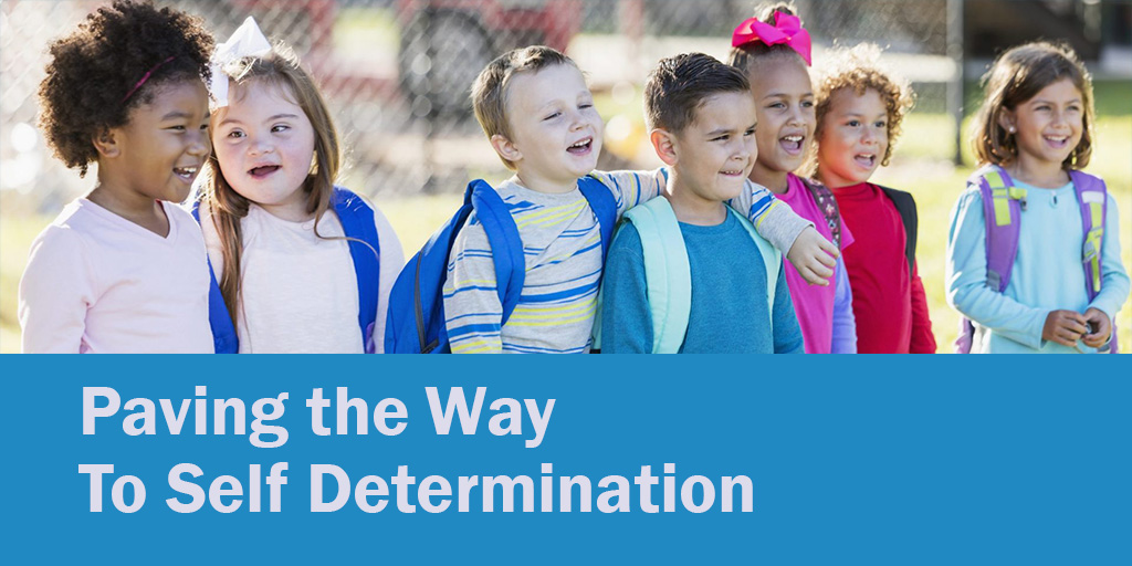 photo of a line of children Text: Paving the Way to Self Determination
